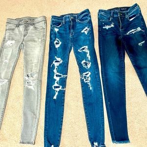 3 pairs of American Eagle Jeans skinny stretch size 0 all for $50.